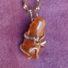 Branche orange collier