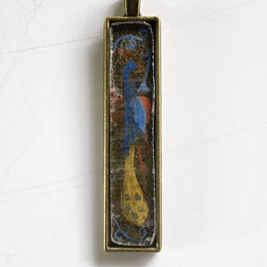 Pendentif en grisaille sur verre antique avec un paon