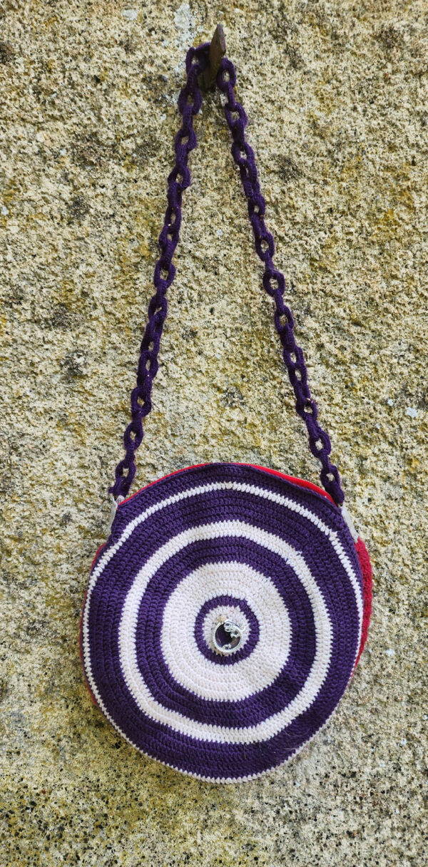 Sac à main circulaire crocheté – Le Regard du Dragon